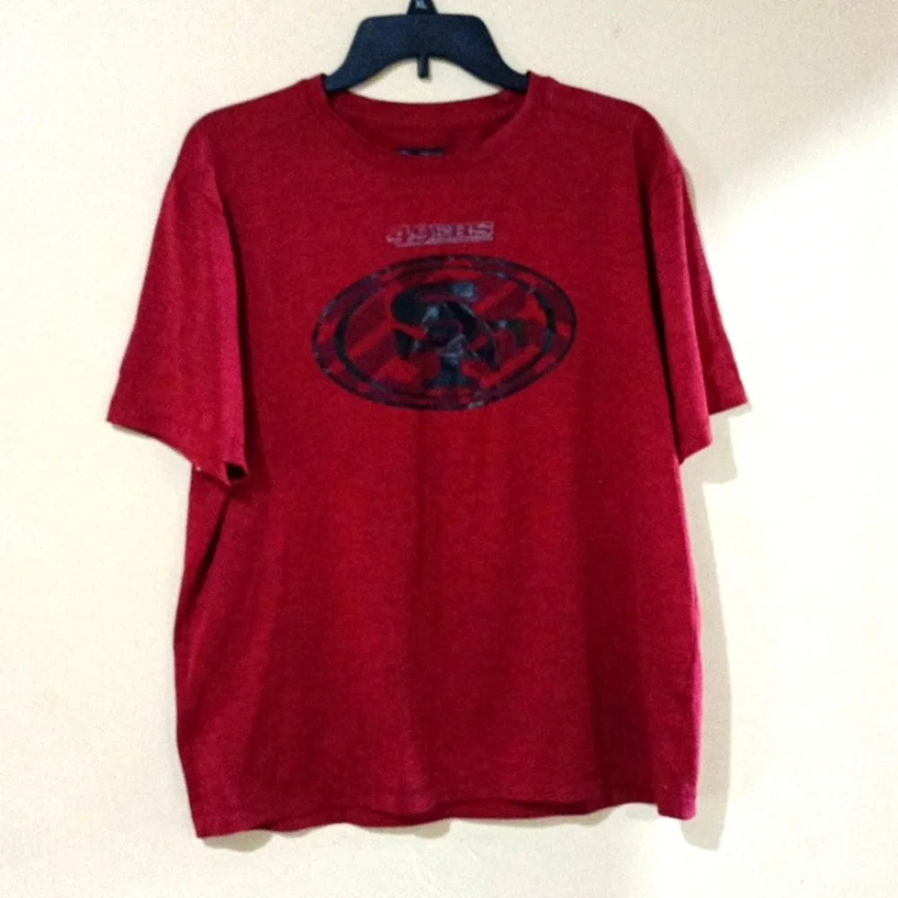 49er NFL Team Apparel shirt. San Francisco black logo on front. Size large. C150